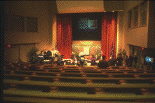 Lister Hill Center auditorium, MEDICOM meeting, 1985 (photograph, 8-bit color, GIF87 format, 103 pixels high, 155 pixels wide, 11416 bytes)